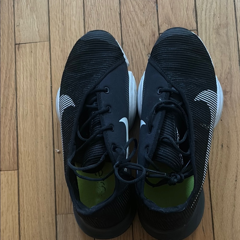 Nike Black and White Athletic Shoes with Mesh Upper